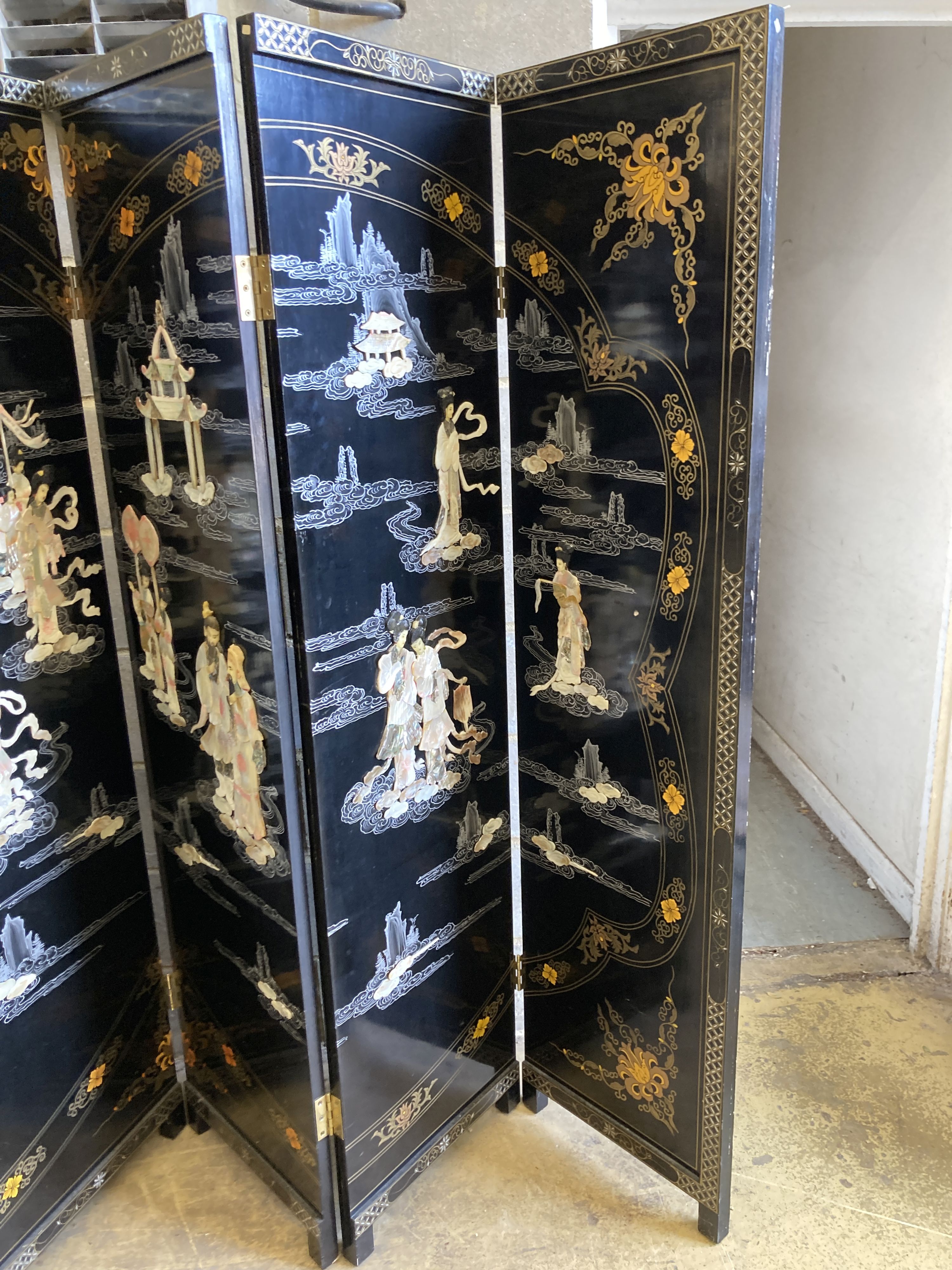 A 1920's - 30s Chinese inlaid mother of pearl six fold screen, each panel 45cm wide, height 183cm 72 x 95ins